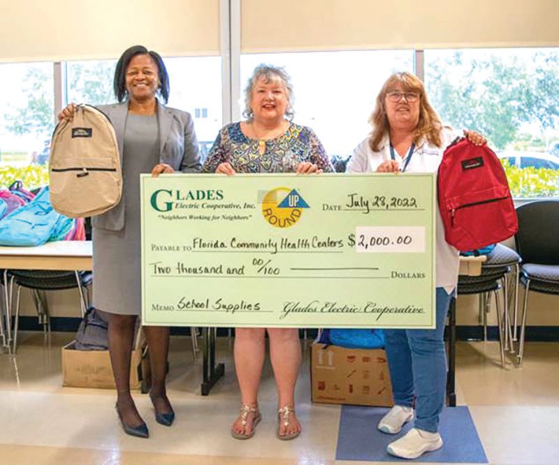 GECT President Kelly Brantley (center) presented Florida Community Health Centers’ Clewiston Center Administrator Nardina Johnson (left) and Moore Haven Center Administrator Traci Thomas (right) with a $2,000 grant award for backpack and school supply giveaways.